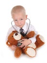 Child Pretending to be a Doctor With Teddy Bear Royalty Free Stock Photo