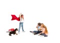 Child pretending to be a superhero with her super dog and friends sitting around Royalty Free Stock Photo