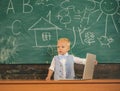 Child programming on laptop in computer class. Developing programming and coding technologies in school