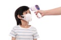 child with protection mask with infared thermometer