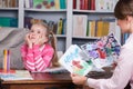 Child psychologist discusses drawing a little girl Royalty Free Stock Photo