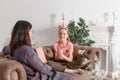 Child psychologist talking with a teenage girl in his office. Psychological assistance to children. Teenager girl smiling Royalty Free Stock Photo