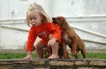 Child and puppy pet