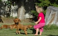 Child and puppy pet