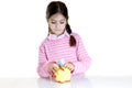 Child putting eur in money box Royalty Free Stock Photo