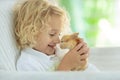 Child with rabbit. Easter bunny. Kids and pets. Royalty Free Stock Photo