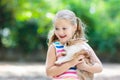 Child with rabbit. Easter bunny. Kids and pets. Royalty Free Stock Photo