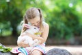 Child with rabbit. Easter bunny. Kids and pets. Royalty Free Stock Photo