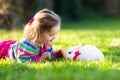 Child with rabbit. Easter bunny. Kids and pets Royalty Free Stock Photo