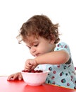 Child with raspberry Royalty Free Stock Photo