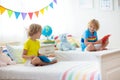 Child reading in bed. Kids read. Boy at home Royalty Free Stock Photo