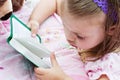 Child reading Bible Royalty Free Stock Photo
