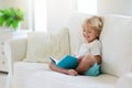 Child reading book. Kids read books Royalty Free Stock Photo