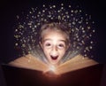 Child reading a magic story book Royalty Free Stock Photo
