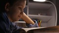 Child Reading in Night, School Girl Studying in Dark, Kid Learning, Homework Royalty Free Stock Photo