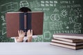 Child reads textbooks seriously in class Royalty Free Stock Photo