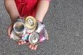 Child Recycling Aluminum Cans