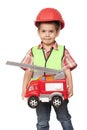 Child in a red helmet and with a fire engine in his hands Royalty Free Stock Photo