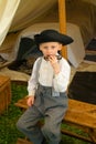 Child Reeactor Playing a Harmonica