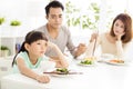 Child refuses to eat while family dinner Royalty Free Stock Photo