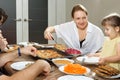 The child refuses to eat at a family dinner Royalty Free Stock Photo