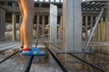 Child removing the sand of the beach on a shower