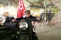Child on retro military motorcycle M-72