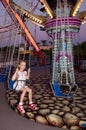 Child rides a carousel