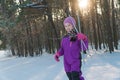 Child rides on skis. forest in winter winter ski child