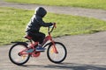 Child riding Bicycle. Boy learning to ride a bike Royalty Free Stock Photo