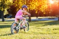 Child riding a bicycle. The kid in helmet on bike Royalty Free Stock Photo
