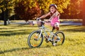 Child riding a bicycle. The kid in helmet on bike Royalty Free Stock Photo