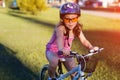 Child riding a bicycle. The kid in helmet on bike Royalty Free Stock Photo