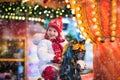 Child riding carousel on Christmas market Royalty Free Stock Photo