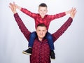 Child riding on dads shoulders. Happiness being father of boy. Having fun. Fathers day. Father example of noble human