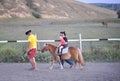 Child riding pony