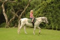 Child riding pony Royalty Free Stock Photo