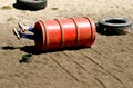 Child rolling down hill in playground Royalty Free Stock Photo