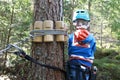 Child in rope adventure park