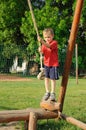 Child on rope swing