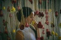 Child with roses in florist shop, floristry