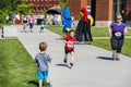 Child runner completes 5K charity walk/run Royalty Free Stock Photo