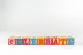 A child`s alphabet toy spelling word block set, spelling out the word celebrate Royalty Free Stock Photo