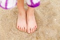 Child's bare feet in sand Royalty Free Stock Photo