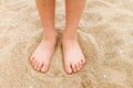 Child's bare feet in sand Royalty Free Stock Photo