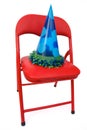 Child's chair with party hat