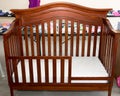 Child`s crib for sale at suburban garage sale Royalty Free Stock Photo