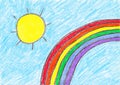 Child`s drawing of the sun and a rainbow Royalty Free Stock Photo