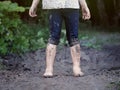 Child`s feet covered with dirt. Royalty Free Stock Photo