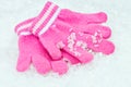 Child's gloves in the snow